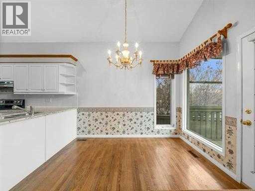 Single Family House Bungalow for Sale in  Tuscany Hills Road NW Tuscany Calgary 