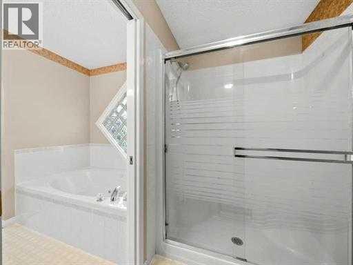 Single Family House Bungalow for Sale in  Tuscany Hills Road NW Tuscany Calgary 