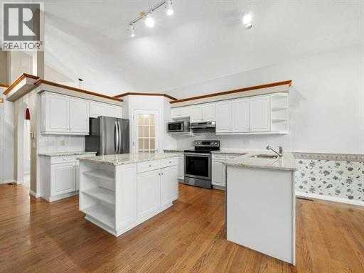 Single Family House Bungalow for Sale in  Tuscany Hills Road NW Tuscany Calgary 