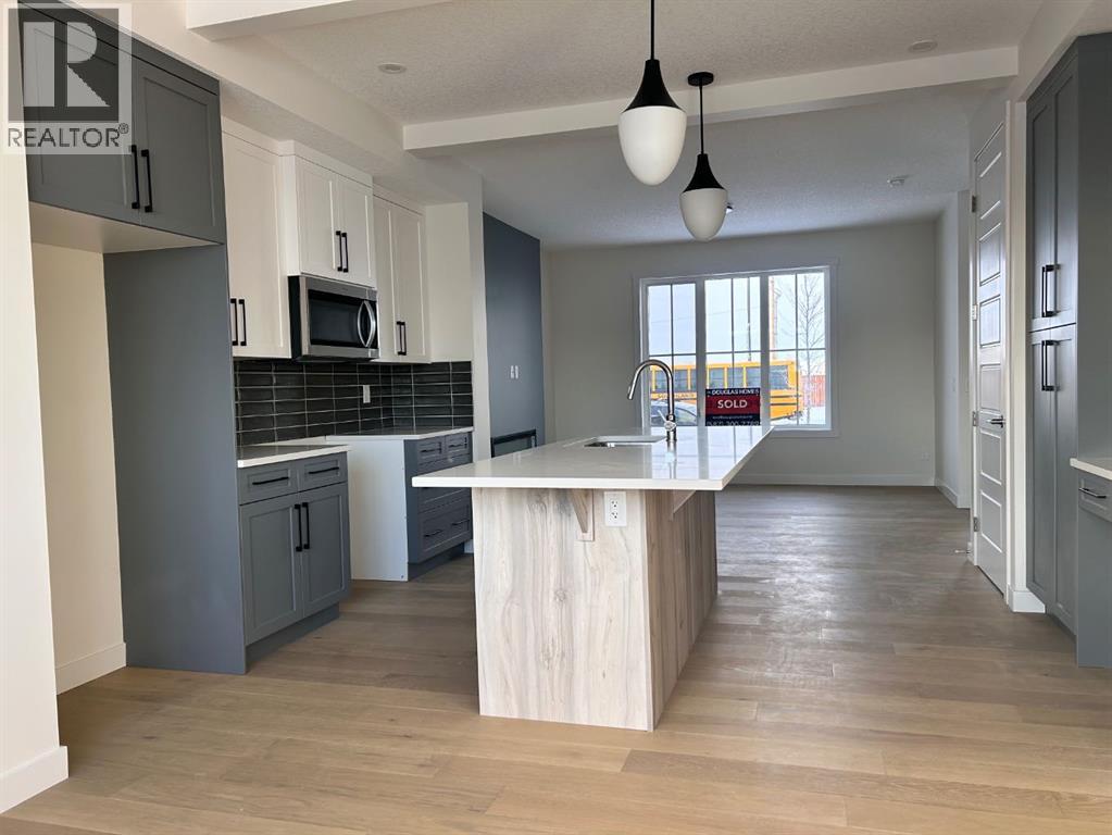 Single Family House for Sale in  Sora Gate SE Hotchkiss Calgary 