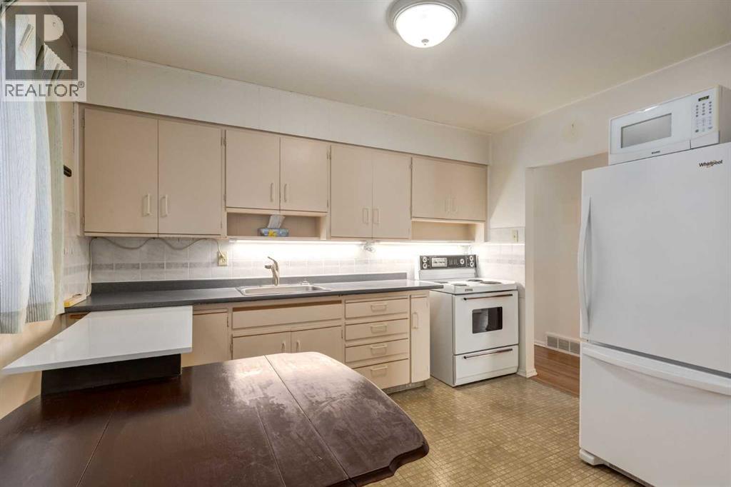 Single Family House Bungalow for Sale in   Street SW Glenbrook Calgary 