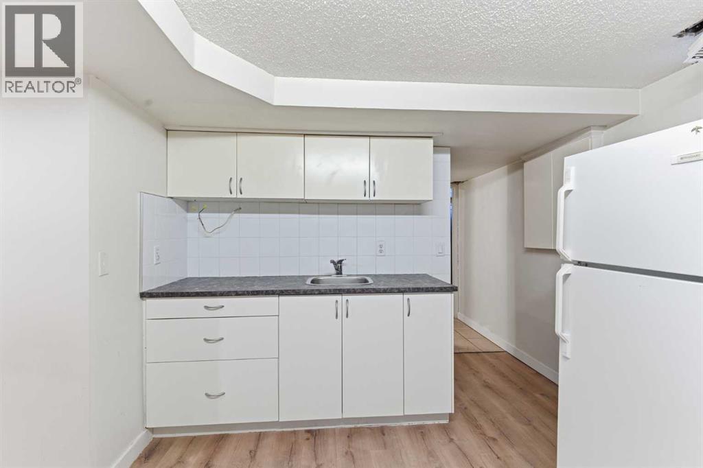 Single Family House Bungalow for Sale in   Avenue NE Crescent Heights Calgary 