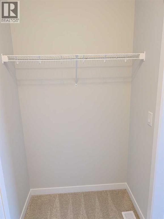 Single Family House for Sale in   Belmont Street SW Belmont Calgary 