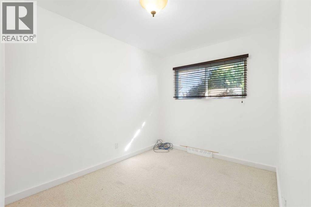 Single Family House Bungalow for Sale in  Kingsland Place SW Kingsland Calgary 