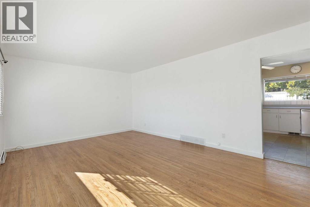 Single Family House Bungalow for Sale in  Kingsland Place SW Kingsland Calgary 