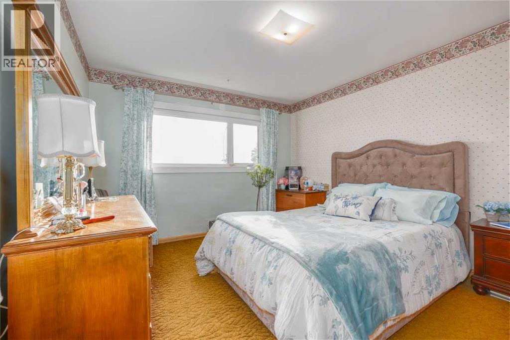 Single Family House Bungalow for Sale in  Highwood Place NW Highwood Calgary 