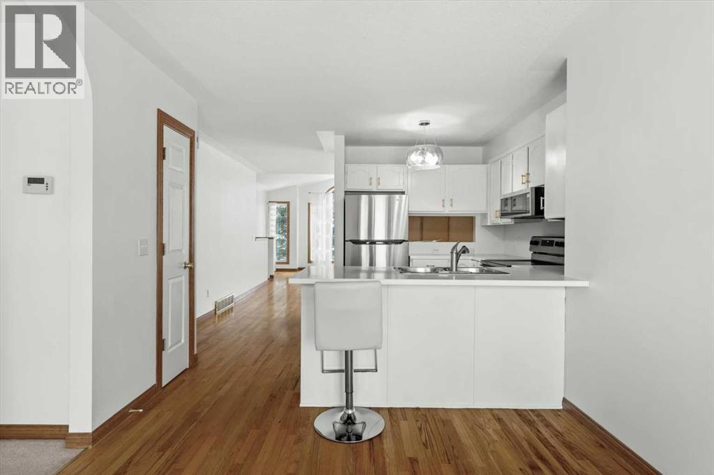 Single Family House Bi-level for Sale in  Scurfield Drive NW Scenic Acres Calgary 