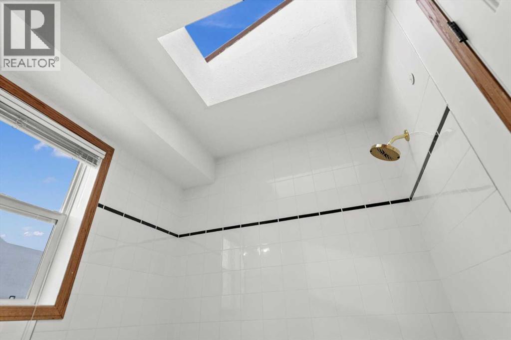 Single Family House Bi-level for Sale in  Scurfield Drive NW Scenic Acres Calgary 