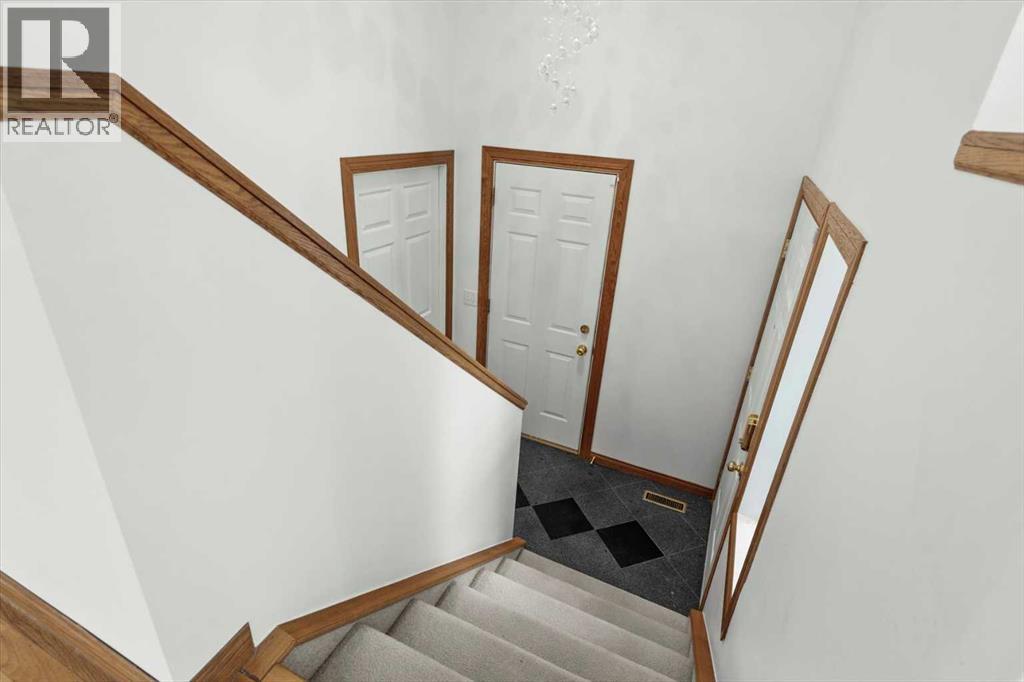 Single Family House Bi-level for Sale in  Scurfield Drive NW Scenic Acres Calgary 