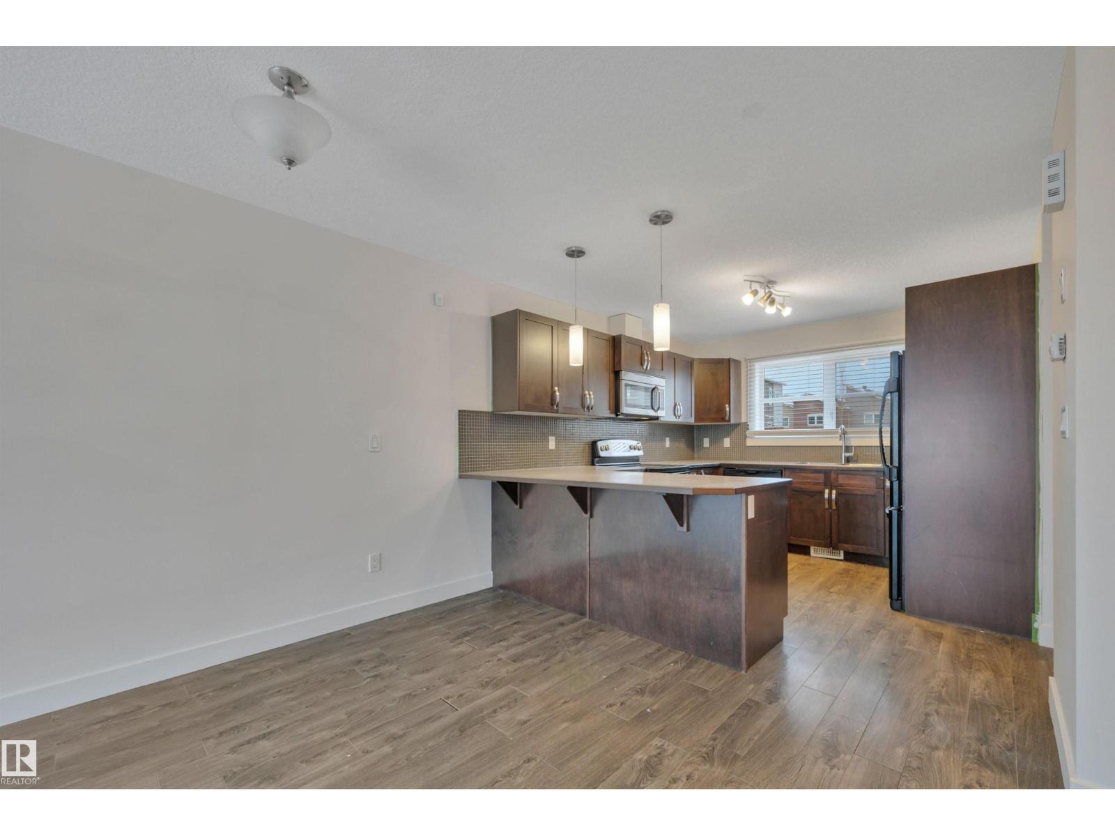 #197 401 SOUTHFORK DR, Leduc