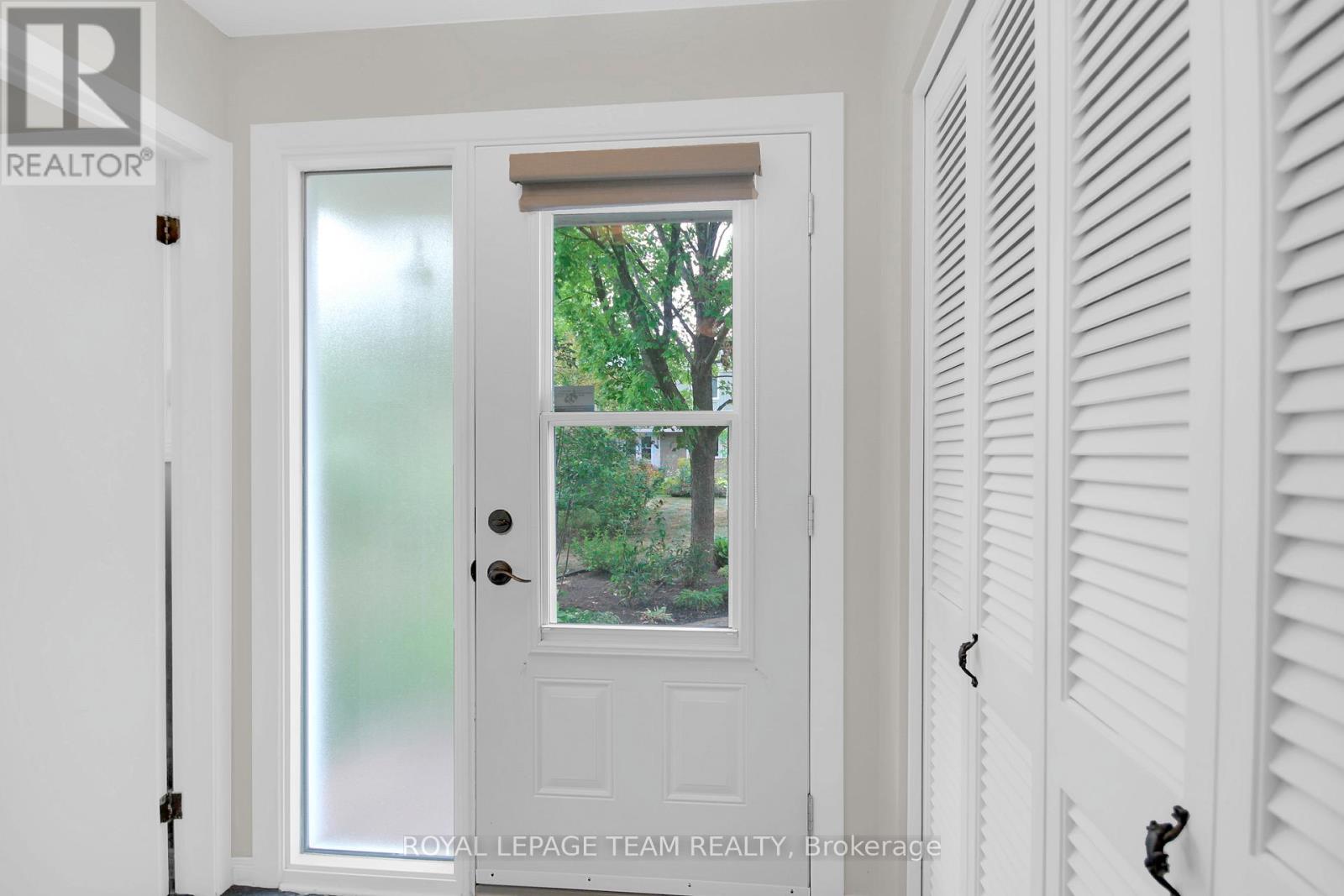 Foyer with tile floor