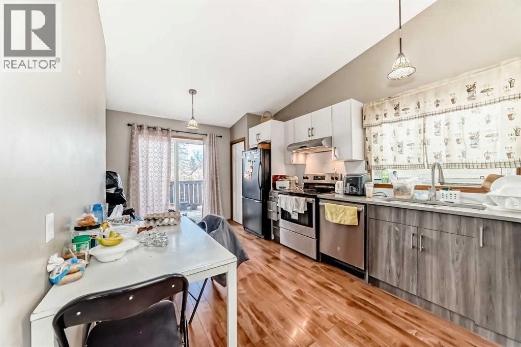 Single Family House 4 Level for Sale in  Hawkwood Boulevard NW Hawkwood Calgary 