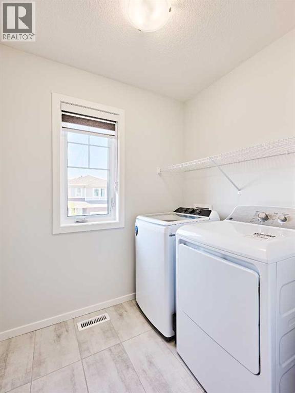 Single Family House for Sale in  Carringham Road NW Carrington Calgary 