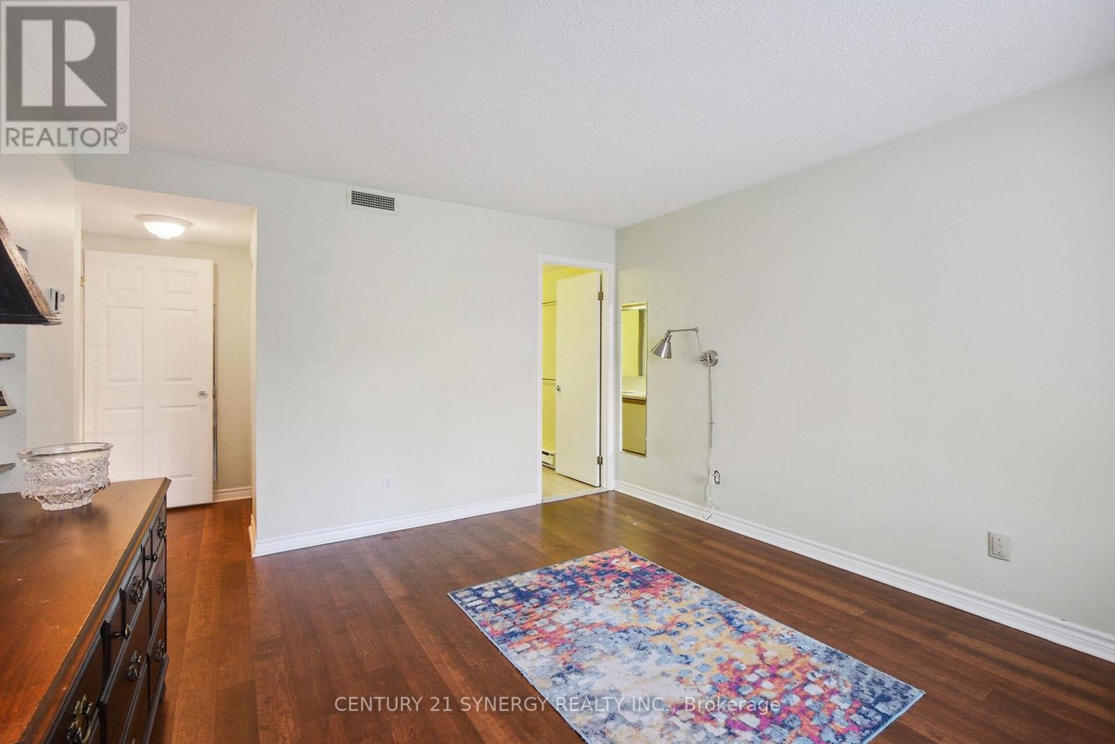 a large room with built in shelving