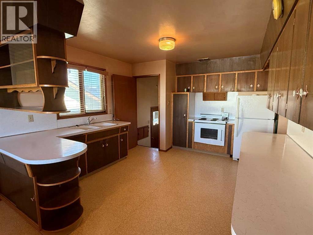 Single Family House Bungalow for Sale in A    Avenue NE Tuxedo Park Calgary 