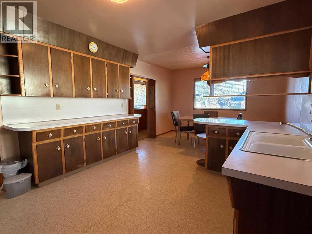 Single Family House Bungalow for Sale in A    Avenue NE Tuxedo Park Calgary 