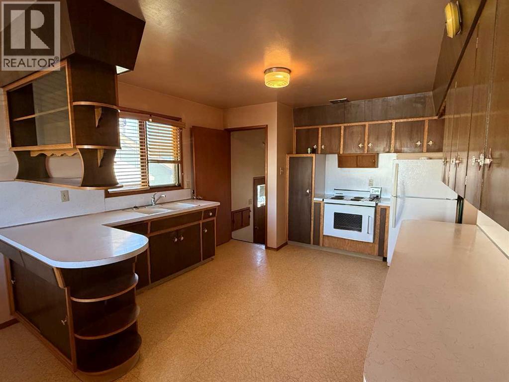 Single Family House Bungalow for Sale in A    Avenue NE Tuxedo Park Calgary 