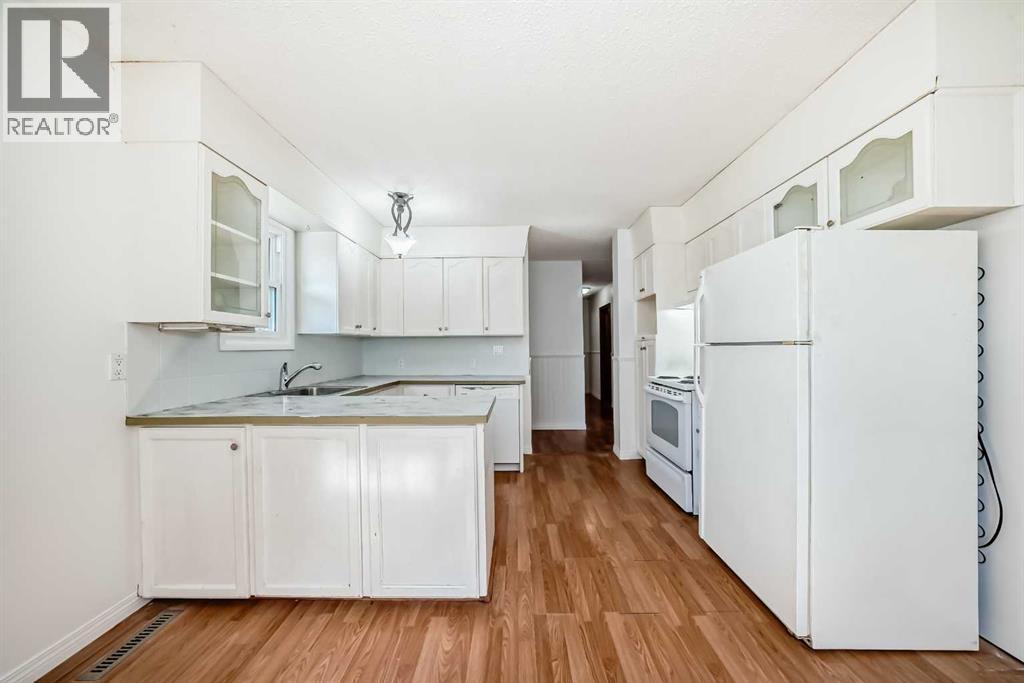 Single Family House Bungalow for Sale in   Street SE Forest Lawn Calgary 