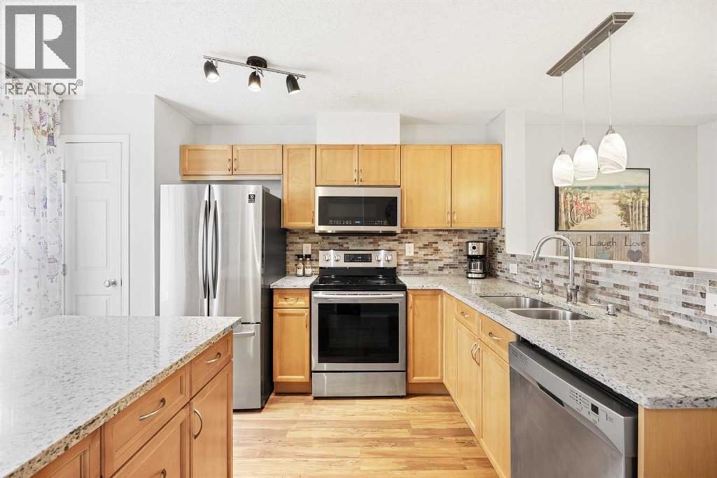 Single Family House 3 Level for Sale in  New Brighton Gardens SE New Brighton Calgary 