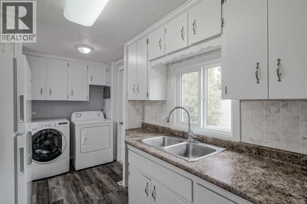 Single Family House Mobile Home for Sale in    Avenue SE Red Carpet Calgary 