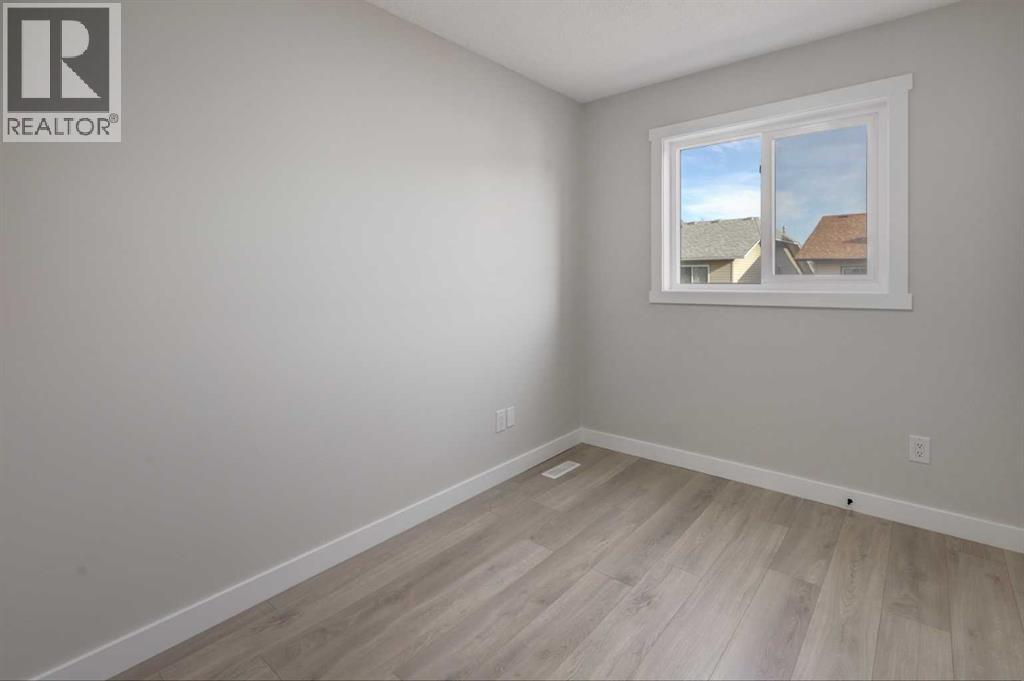 Single Family House Bi-level for Sale in  Falmere Way NE Falconridge Calgary 