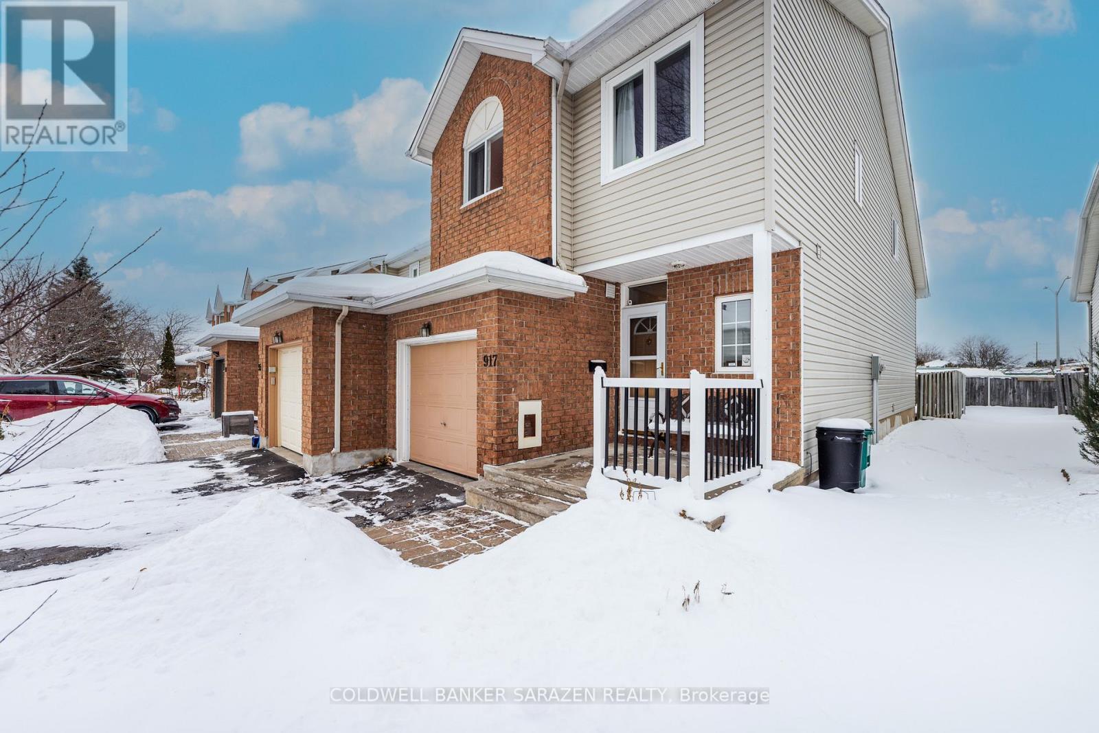 Front- garage with inside entry - welcoming porch