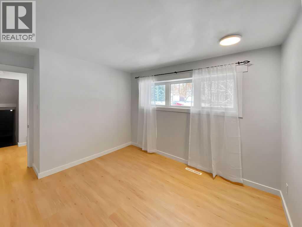 Single Family House 4 Level for Sale in  Lombardy Crescent SW North Glenmore Park Calgary 