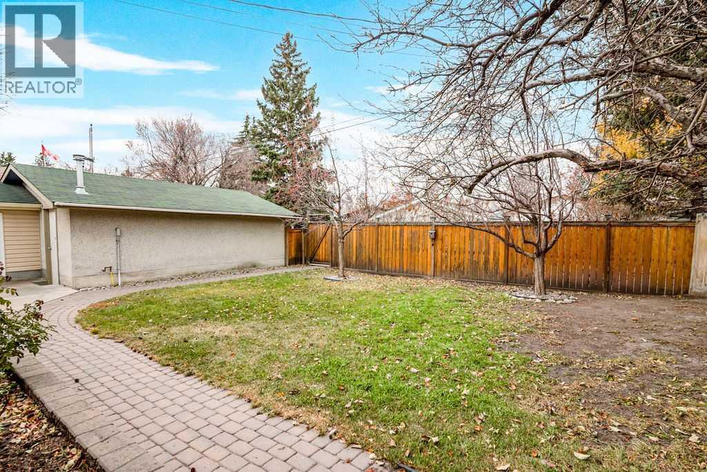 Single Family House 4 Level for Sale in  Lombardy Crescent SW North Glenmore Park Calgary 