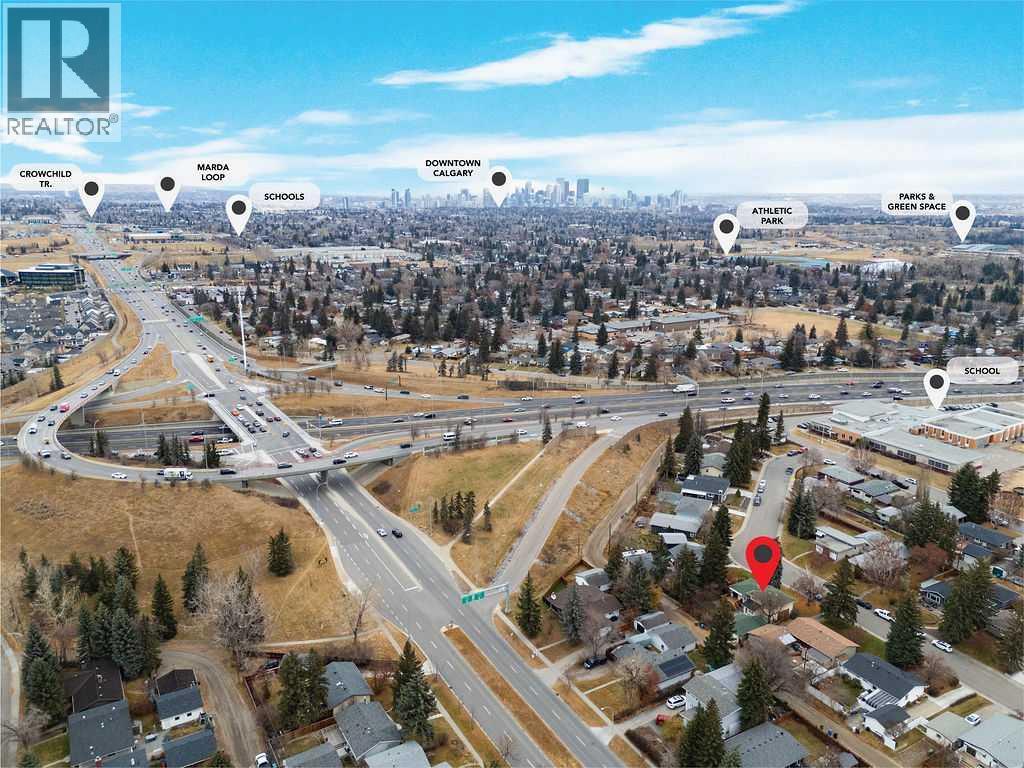 Single Family House 4 Level for Sale in  Lombardy Crescent SW North Glenmore Park Calgary 