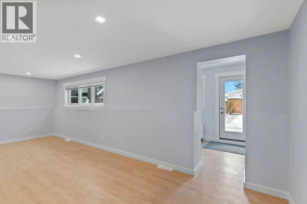 Single Family House 4 Level for Sale in  Lombardy Crescent SW North Glenmore Park Calgary 