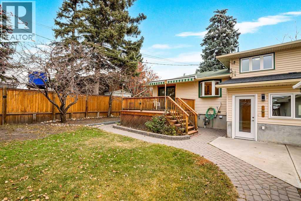 Single Family House 4 Level for Sale in  Lombardy Crescent SW North Glenmore Park Calgary 