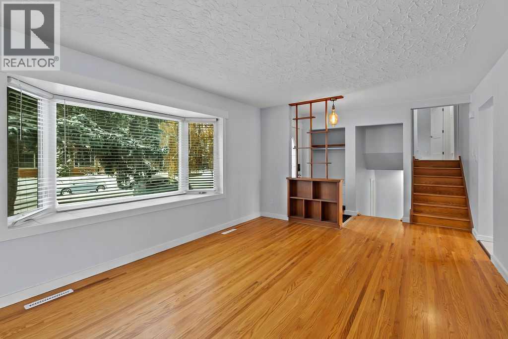 Single Family House 4 Level for Sale in  Lombardy Crescent SW North Glenmore Park Calgary 