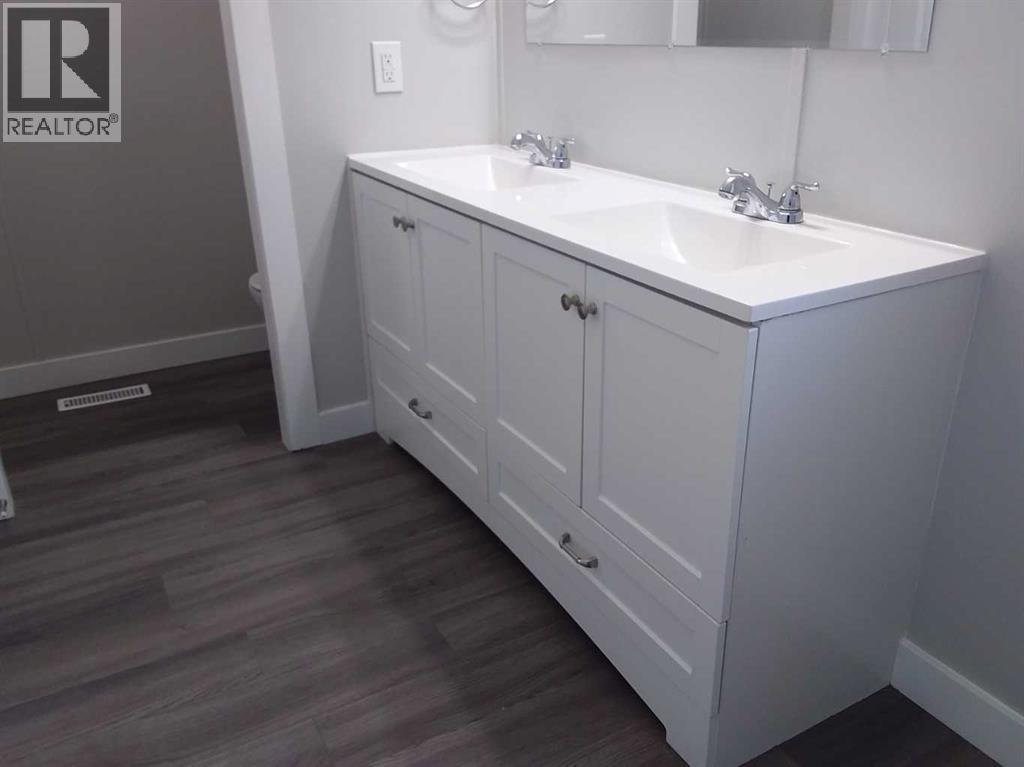 Single Family House Mobile Home for Sale in    Avenue SE Red Carpet Calgary 