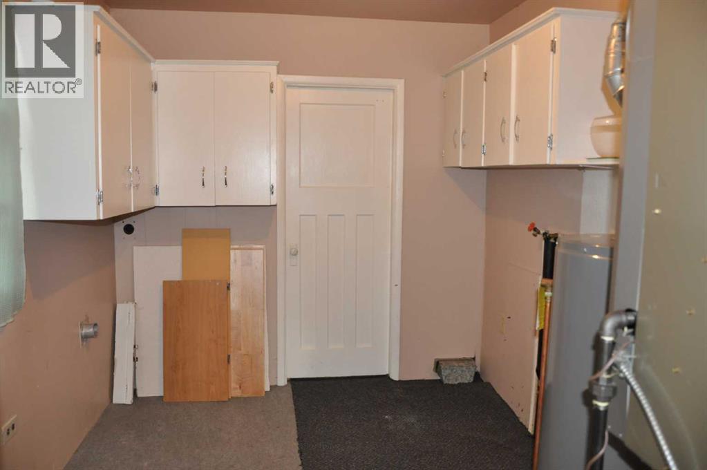 Single Family House Bungalow for Sale in   Avenue S Victoria Park Lethbridge 