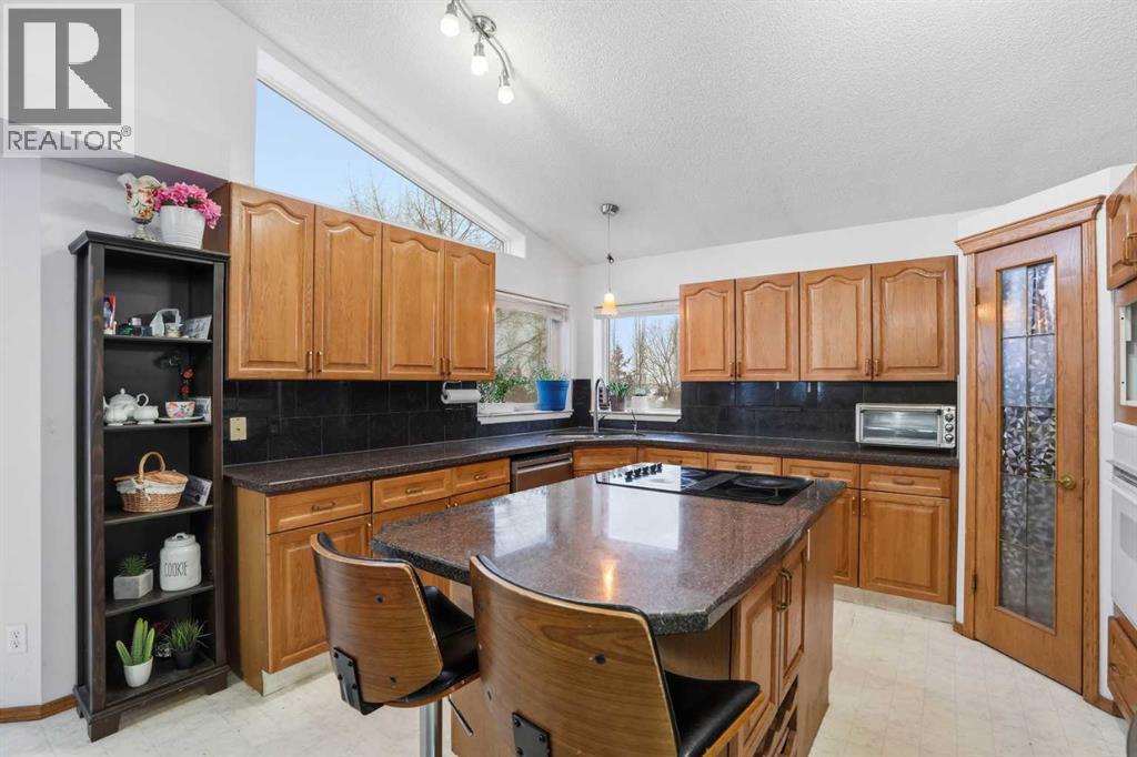 Single Family House Bi-level for Sale in  Arbour Lake Way NW Arbour Lake Calgary 