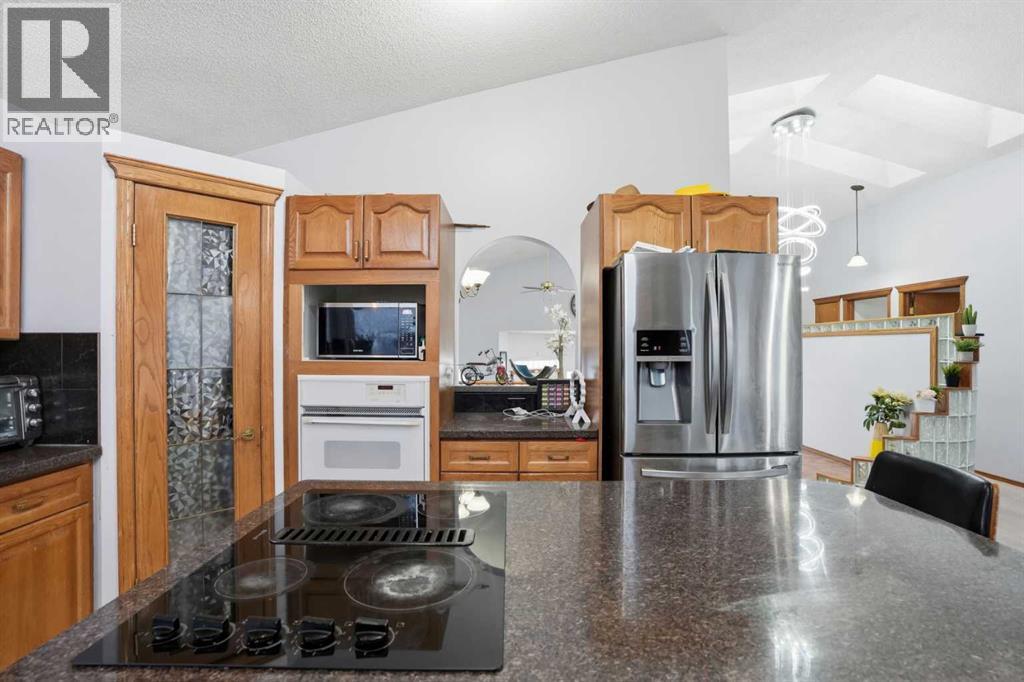 Single Family House Bi-level for Sale in  Arbour Lake Way NW Arbour Lake Calgary 