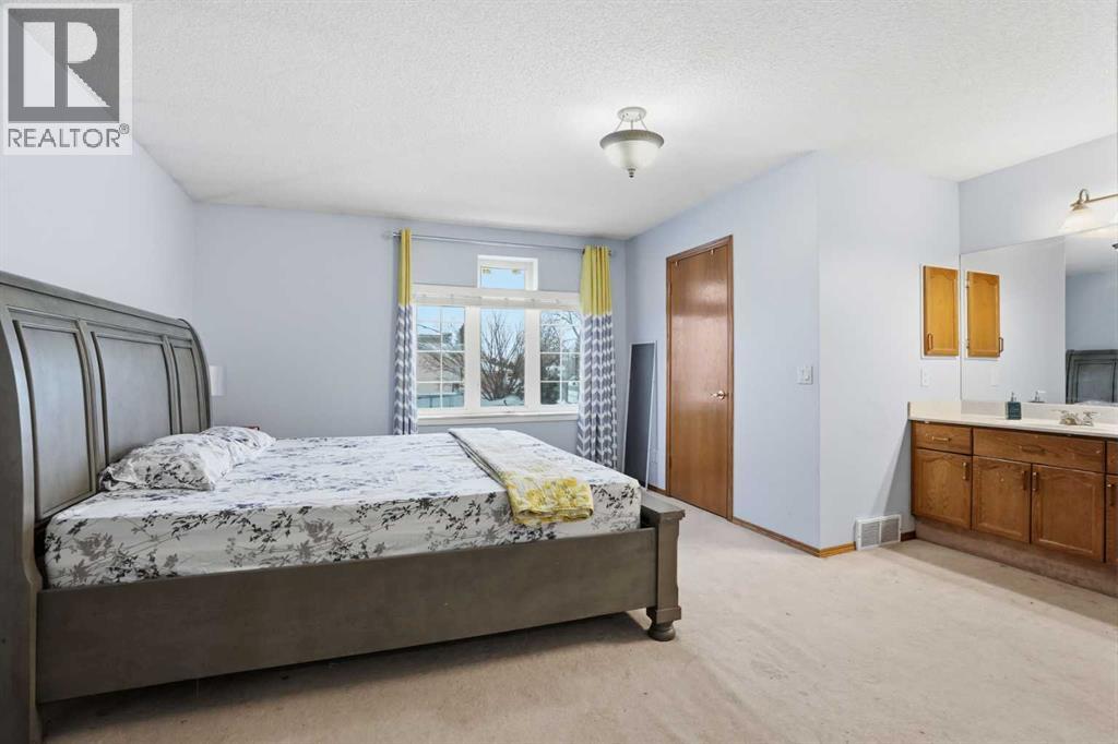 Single Family House Bi-level for Sale in  Arbour Lake Way NW Arbour Lake Calgary 