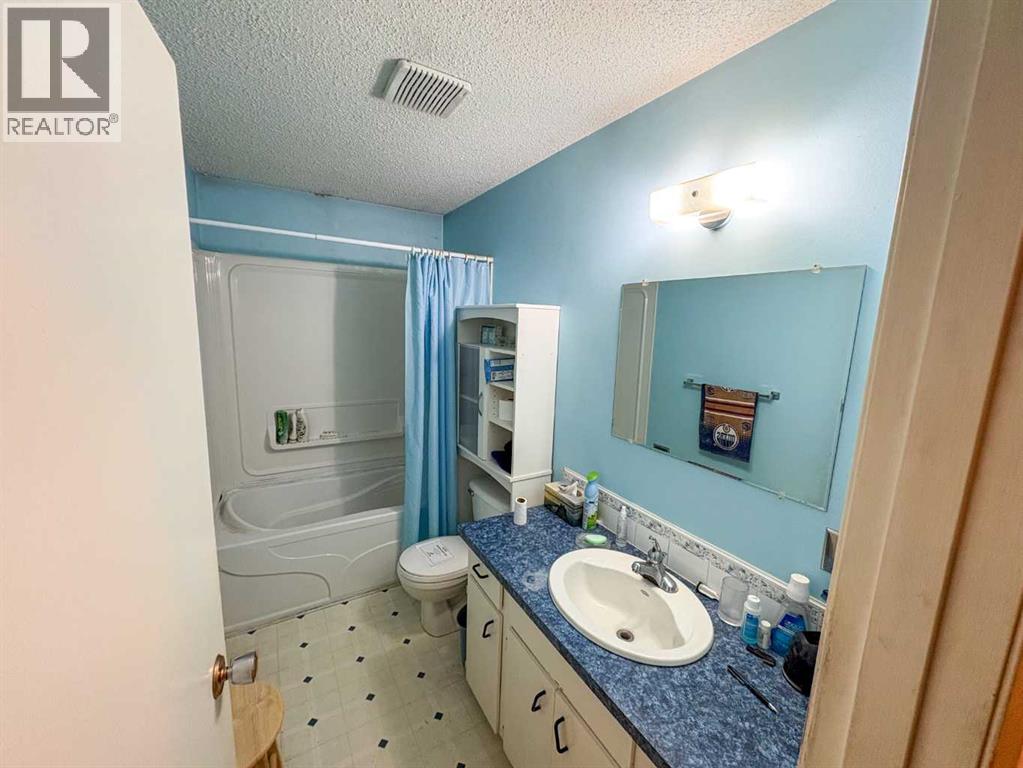 Single Family House Bi-level for Sale in  A Avenue Mountview Grande Prairie 