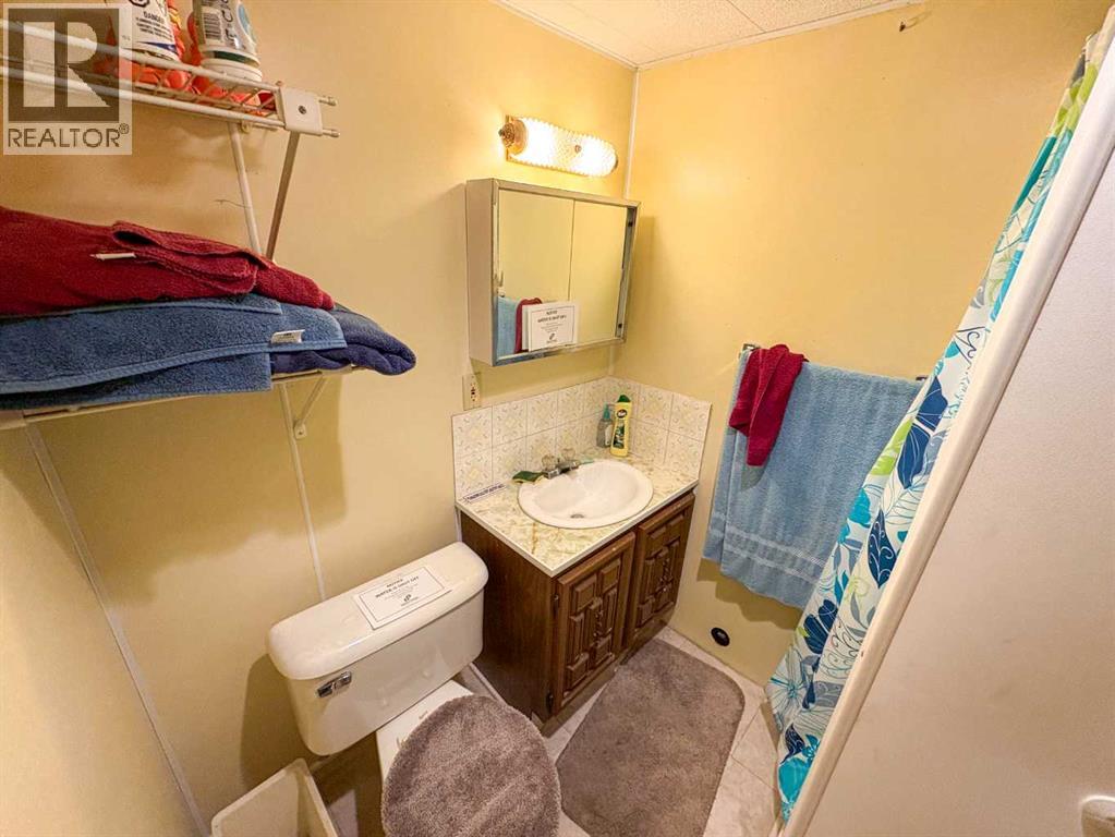 Single Family House Bi-level for Sale in  A Avenue Mountview Grande Prairie 