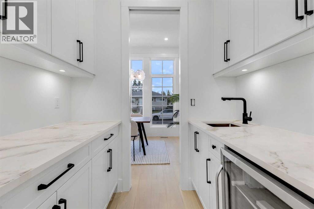 Single Family House for Sale in   Avenue SW Rosscarrock Calgary 