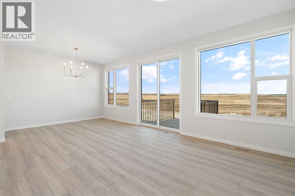 Single Family House for Sale in  Lucas Gardens NW Livingston Calgary 