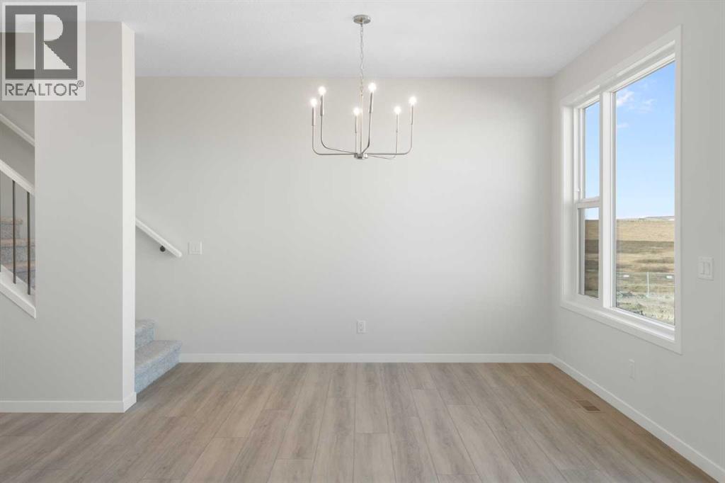 Single Family House for Sale in  Lucas Gardens NW Livingston Calgary 