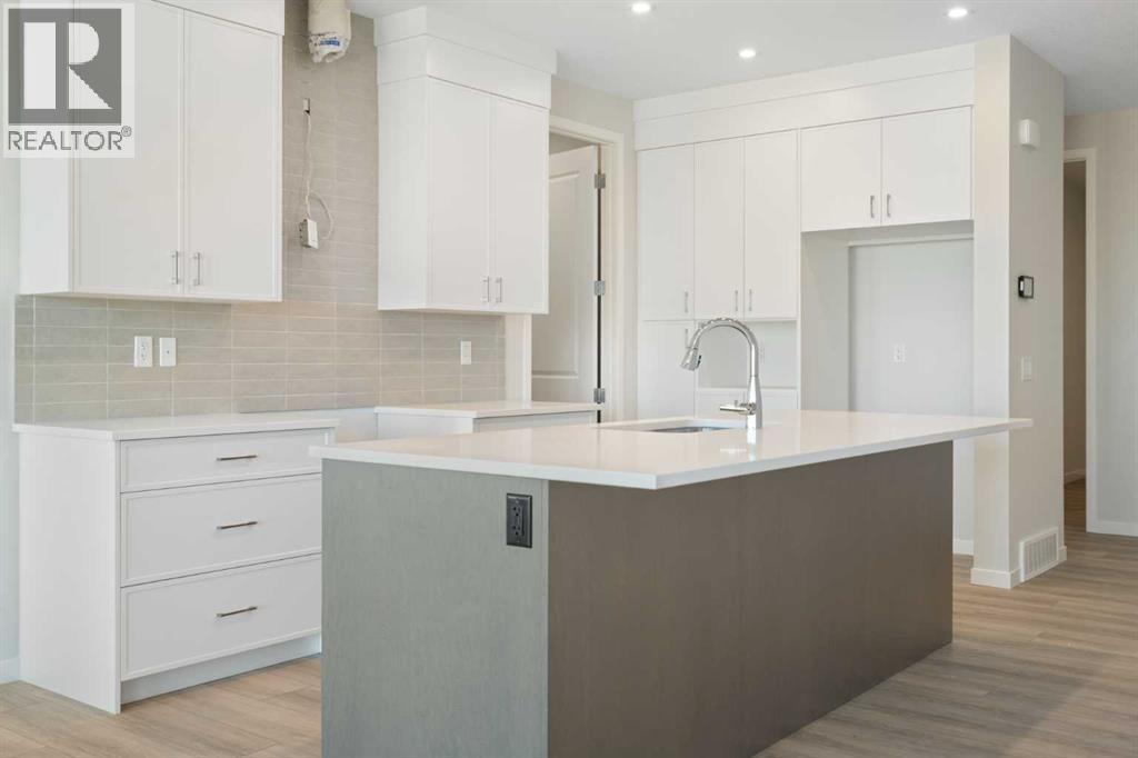 Single Family House for Sale in  Lucas Gardens NW Livingston Calgary 