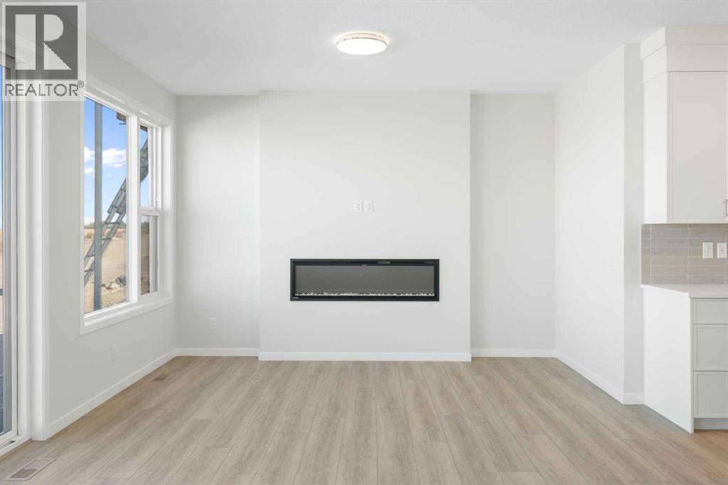 Single Family House for Sale in  Lucas Gardens NW Livingston Calgary 