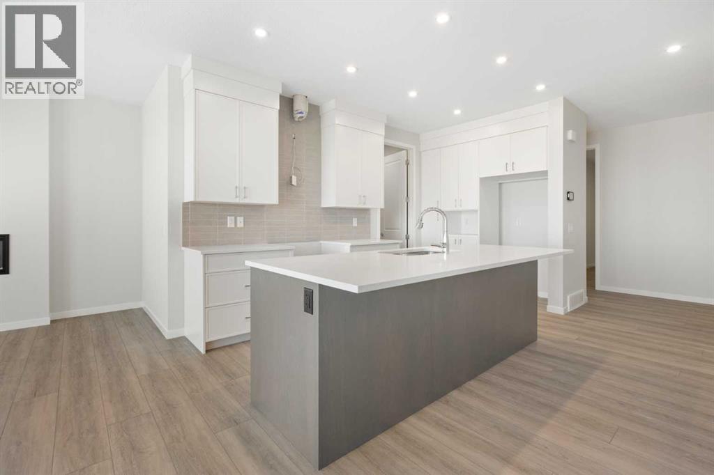 Single Family House for Sale in  Lucas Gardens NW Livingston Calgary 