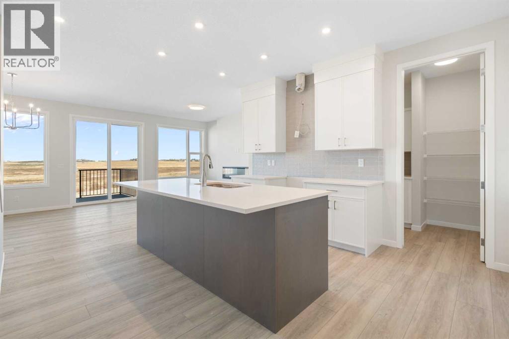 Single Family House for Sale in  Lucas Gardens NW Livingston Calgary 