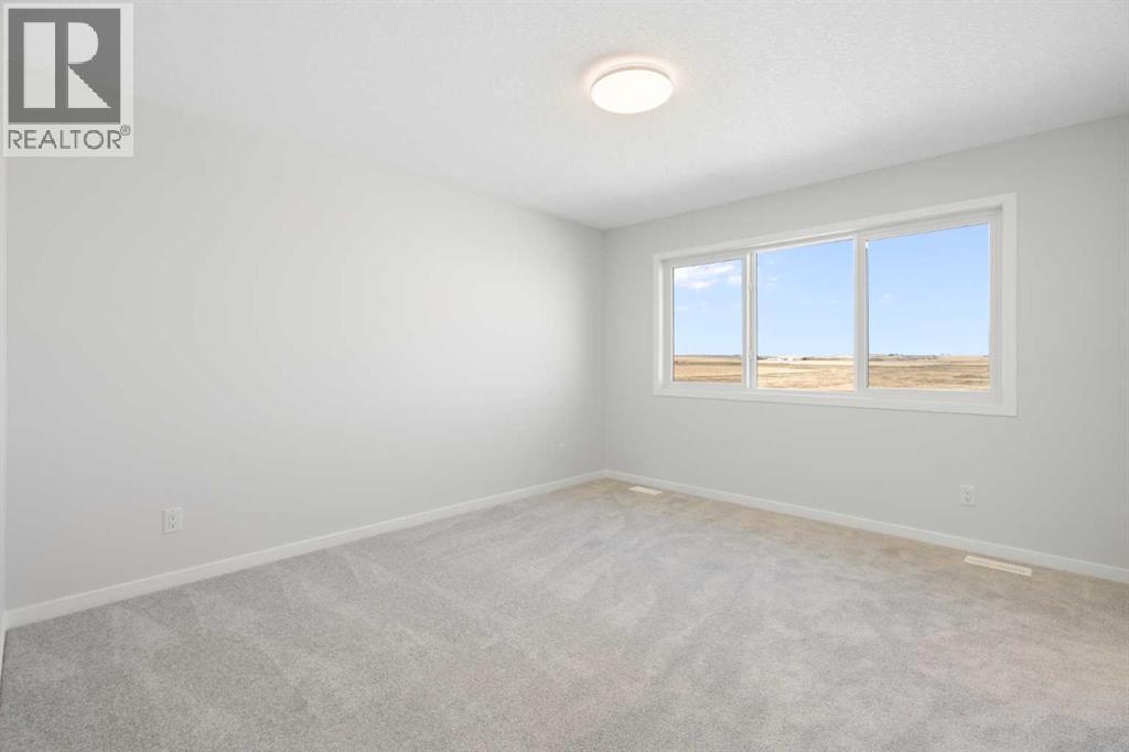 Single Family House for Sale in  Lucas Gardens NW Livingston Calgary 