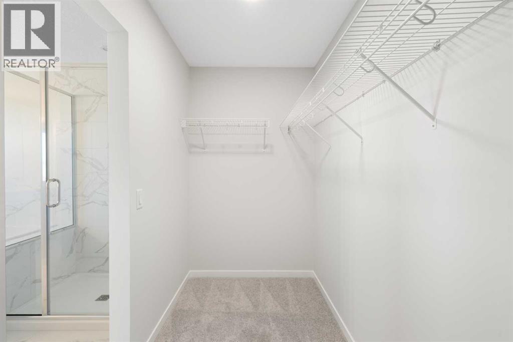 Single Family House for Sale in  Lucas Gardens NW Livingston Calgary 