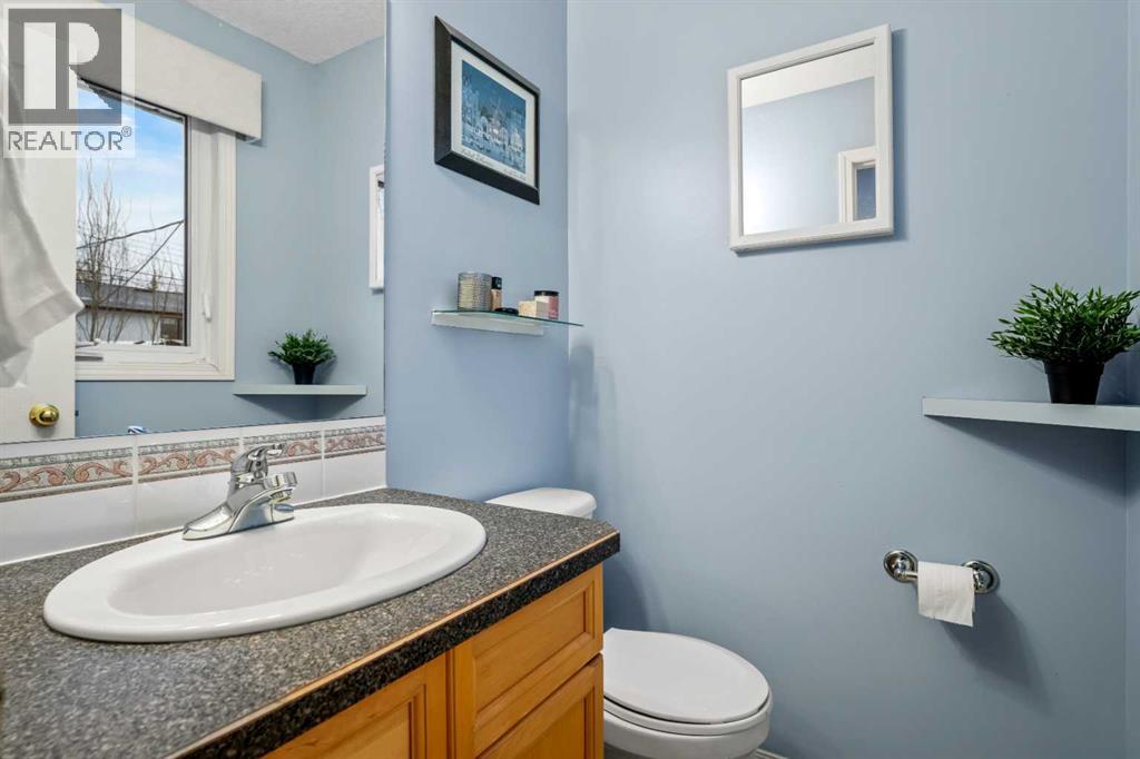 Single Family House Bi-level for Sale in  Lake Crimson Drive SE Lake Bonavista Calgary 