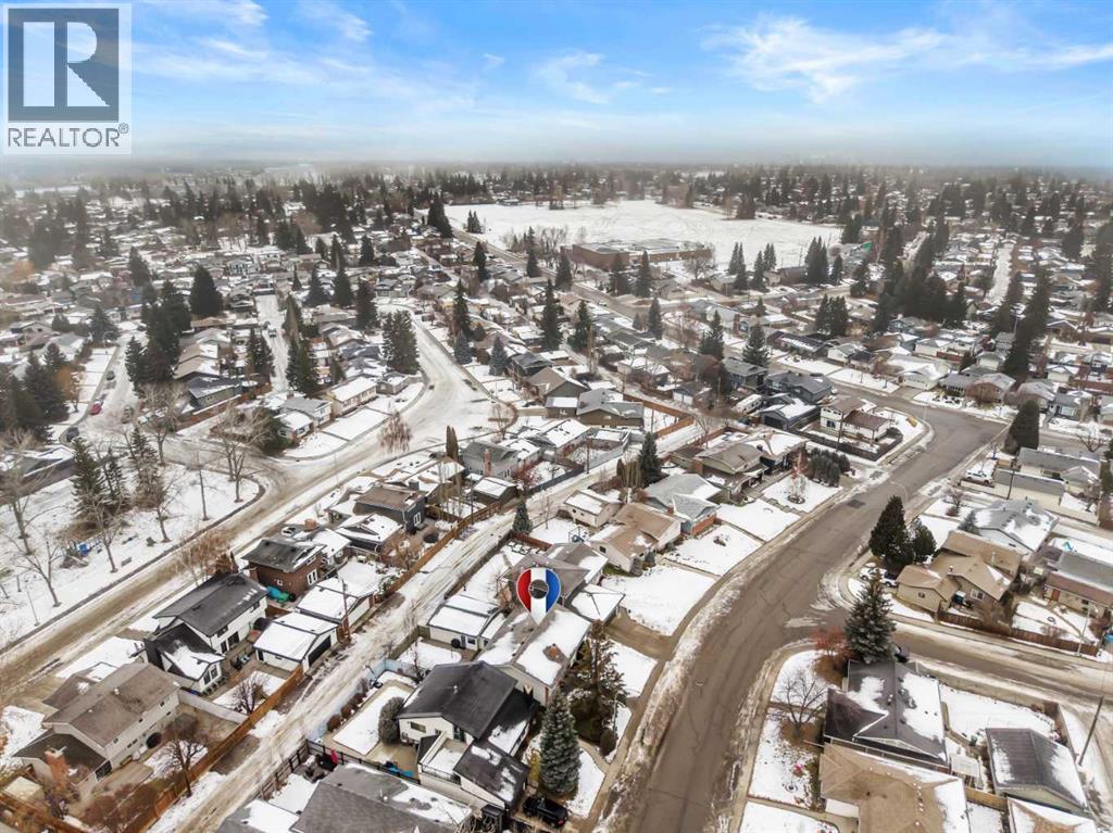 Single Family House Bi-level for Sale in  Lake Crimson Drive SE Lake Bonavista Calgary 